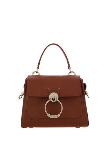 Chloé Tess handbag made of brown calf leather with top handles and gold-tone hardware, stylish and elegant accessory.