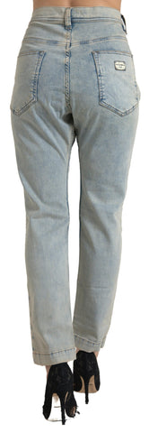 Blue washed cotton mid waist skinny jeans by Dolce & Gabbana, showing fitted style and classic denim details.
