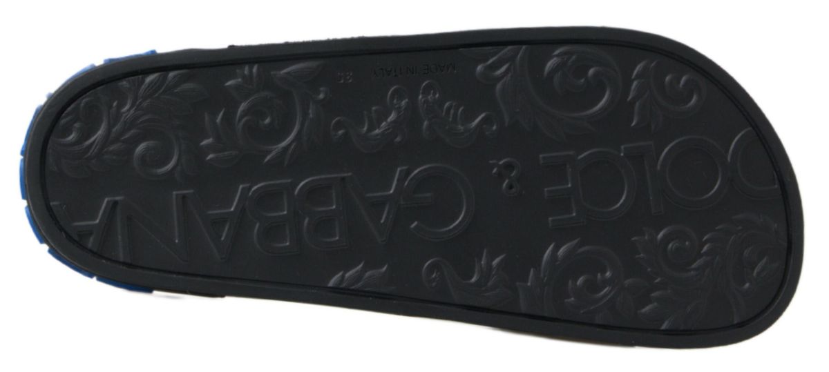 Dolce & Gabbana black slide sandals with beach-inspired design, perfect for casual summer and beachwear.