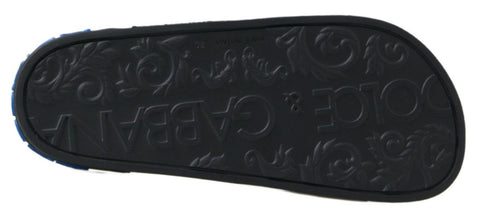 Dolce & Gabbana black slide sandals with beach-inspired design, perfect for casual summer and beachwear.