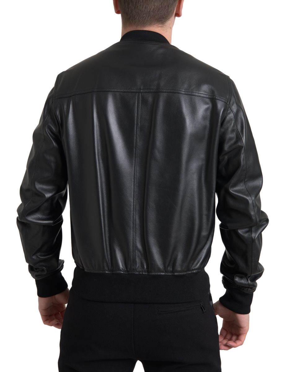 Black leather full-zip bomber men's jacket by Dolce & Gabbana, featuring a sleek design and ribbed collar and cuffs.
