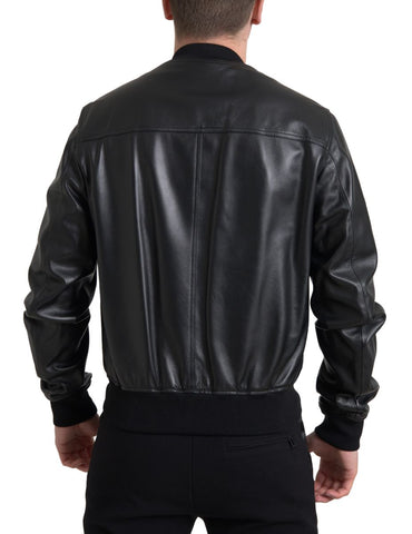 Black leather full-zip bomber men's jacket by Dolce & Gabbana, featuring a sleek design and ribbed collar and cuffs.