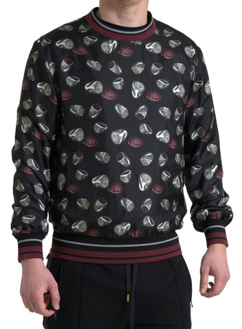 Black silk crewneck sweater with ring print design by Dolce & Gabbana, featuring a relaxed fit and long sleeves.