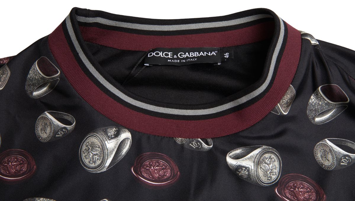 Black silk crewneck sweater with a ring print design by Dolce & Gabbana, showcasing a stylish and luxurious casual top.