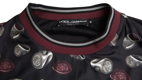 Black silk crewneck sweater with a ring print design by Dolce & Gabbana, showcasing a stylish and luxurious casual top.