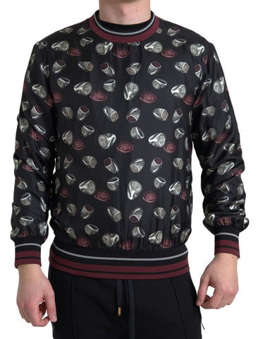Black silk crewneck sweater with ring print from Dolce & Gabbana, featuring a stylish and luxurious design.