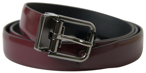 Dolce & Gabbana Bordeaux leather belt with silver metal buckle, stylish accessory with polished finish and classic design.