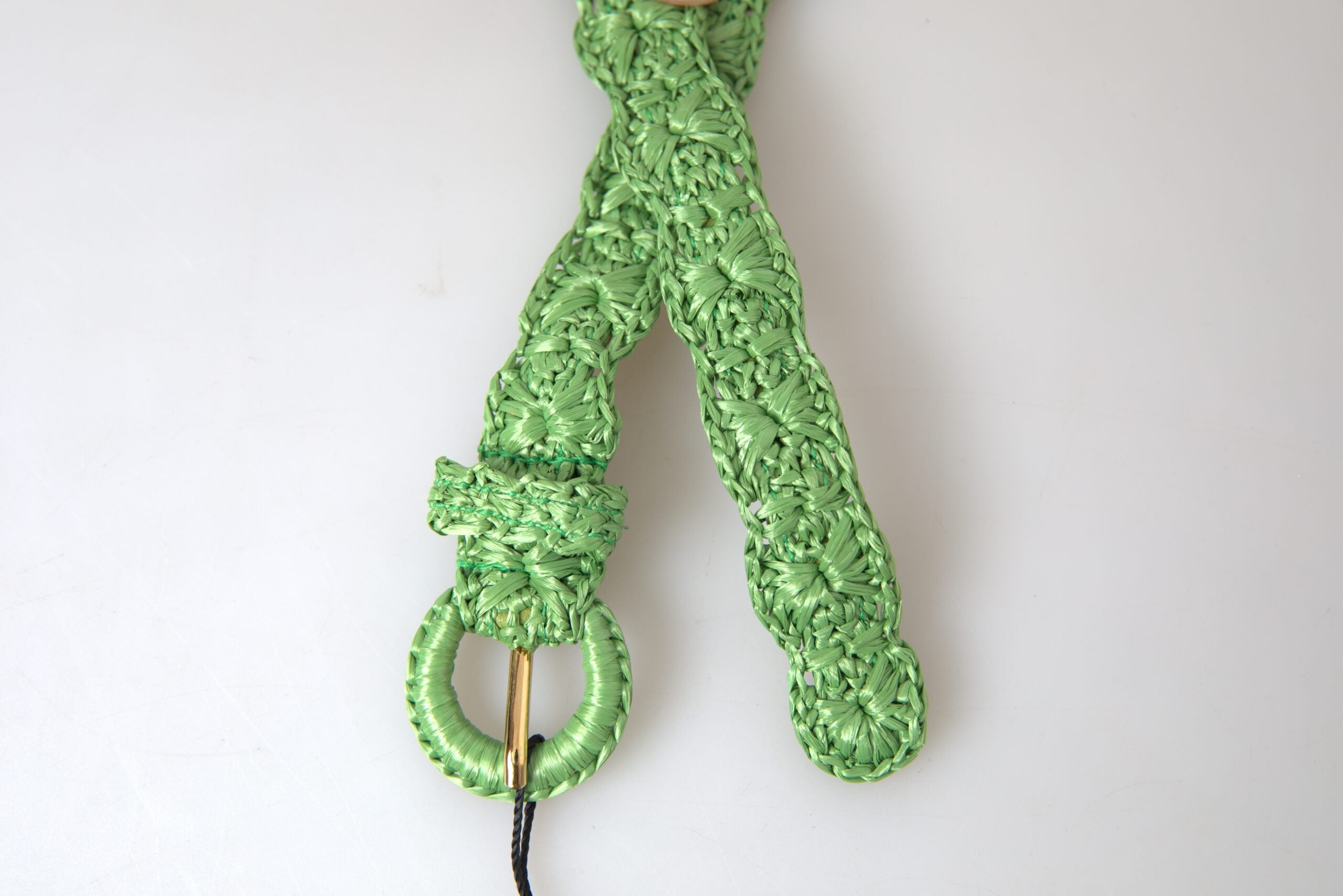 Green viscose woven skinny waist belt by Dolce & Gabbana, featuring a textured design and slim fit for stylish waist accent.