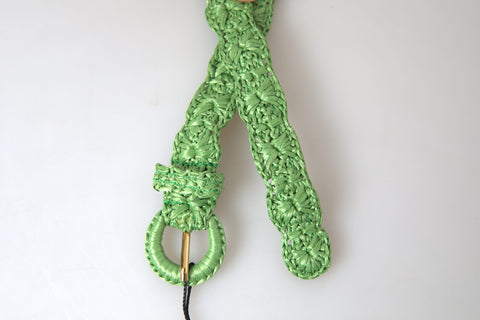 Green viscose woven skinny waist belt by Dolce & Gabbana, featuring a textured design and slim fit for stylish waist accent.