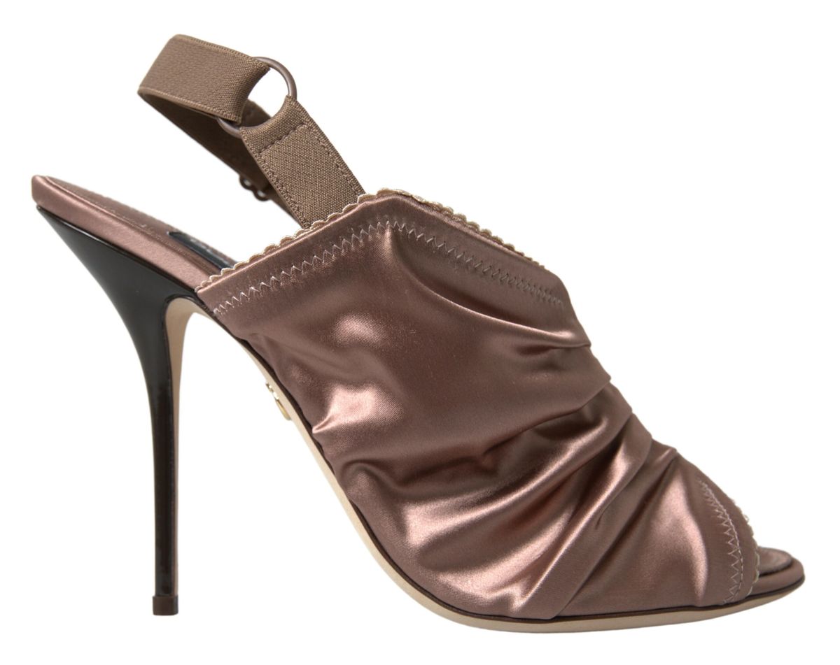 Light brown slingback corset-style stiletto heels by Dolce & Gabbana with fastening strap and elegant design.