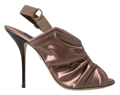Light brown slingback corset-style stiletto heels by Dolce & Gabbana with fastening strap and elegant design.