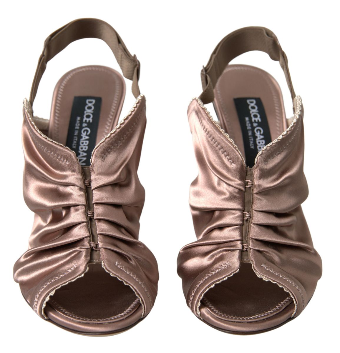 Light brown slingback stiletto heels with corset-style fastening by Dolce & Gabbana, featuring elegant design and sleek silhouette.