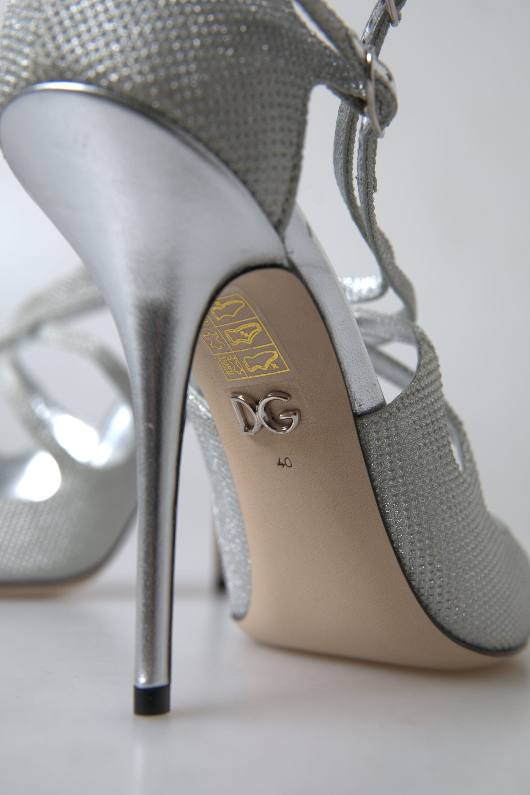 Silver Shimmers Sandals with heel pumps by Dolce & Gabbana, featuring a sleek design and metallic finish.