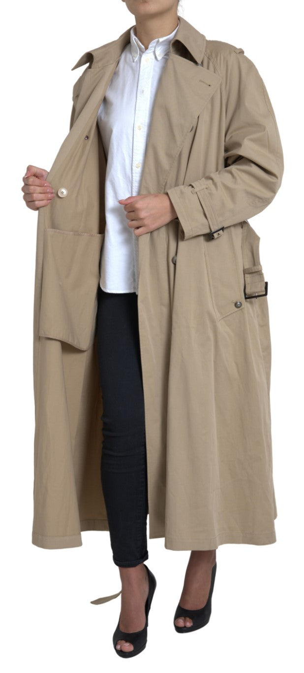 Dolce & Gabbana khaki double-breasted trench coat jacket with classic design and stylish lapels, displayed on a hanger.