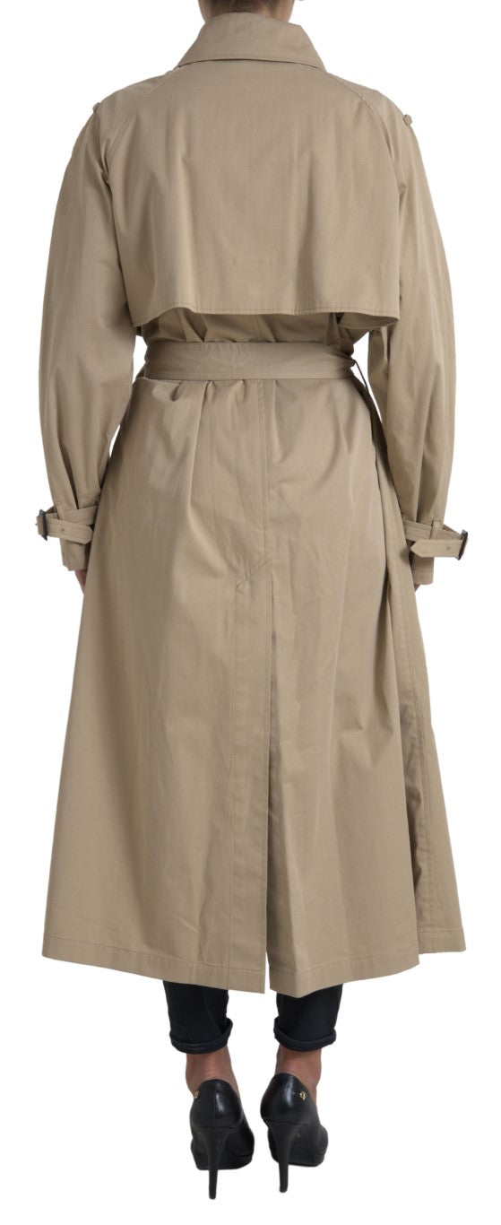 Dolce & Gabbana khaki double-breasted trench coat jacket with belted waist and classic collar, displayed on a hanger.