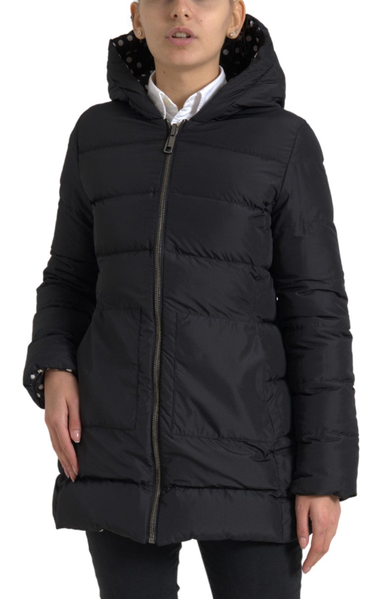 Reversible black polyester hooded jacket by Dolce & Gabbana, showcasing the outer and inner sides with hood and zipper details.