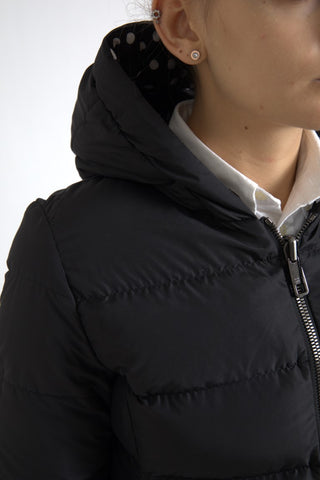 Reversible black polyester hooded jacket from Dolce & Gabbana, showing both outer and inner sides with hood and zip closure.