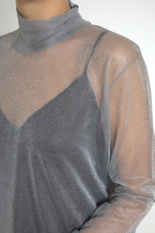 Gray mesh turtleneck long sleeve blouse top by Dolce & Gabbana, featuring a fitted design and sheer fabric.