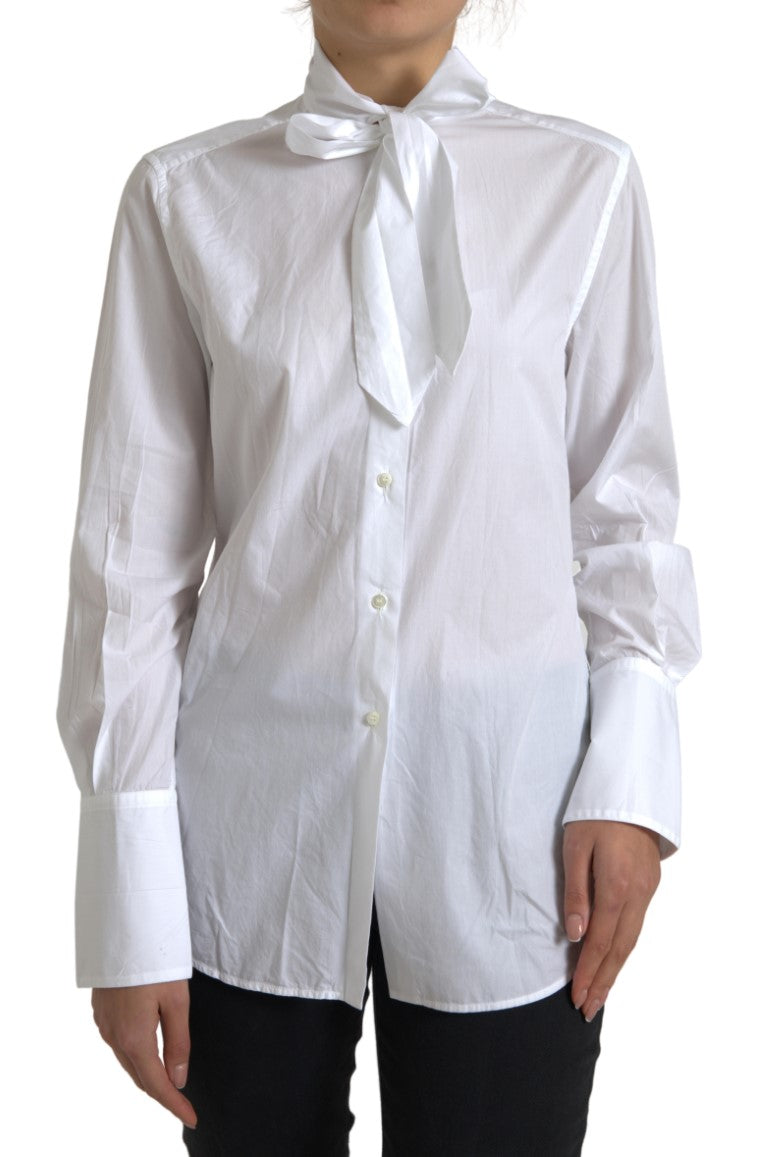 White cotton long sleeve top with ascot collar, designed by Dolce & Gabbana, featuring a classic and elegant style.