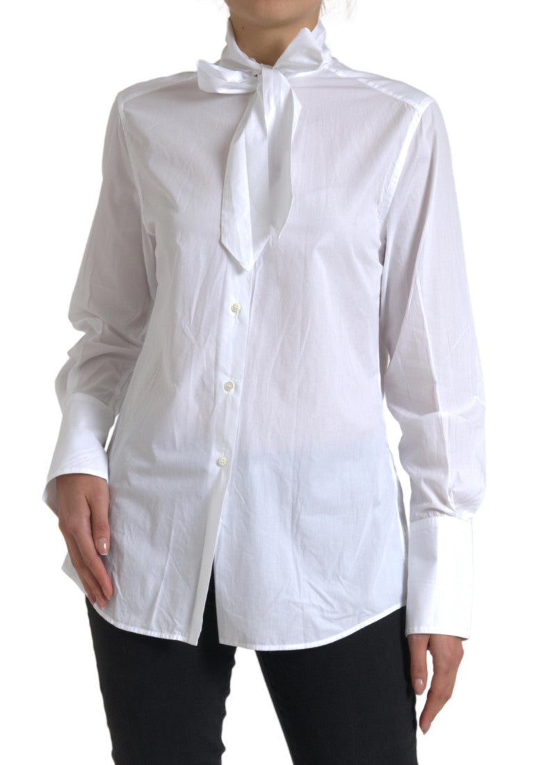White cotton long sleeve top with an ascot collar by Dolce & Gabbana, featuring elegant, classic design.