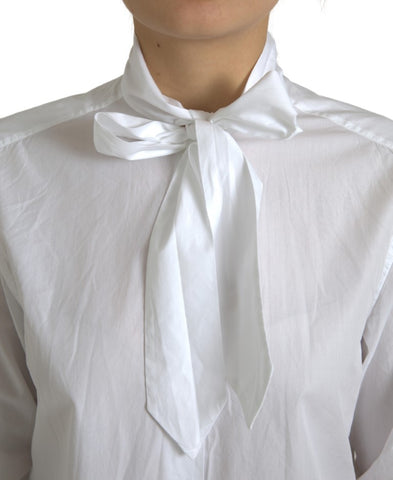 White cotton long sleeve ascot collar top by Dolce & Gabbana, featuring a classic design with a stylish ascot detail.