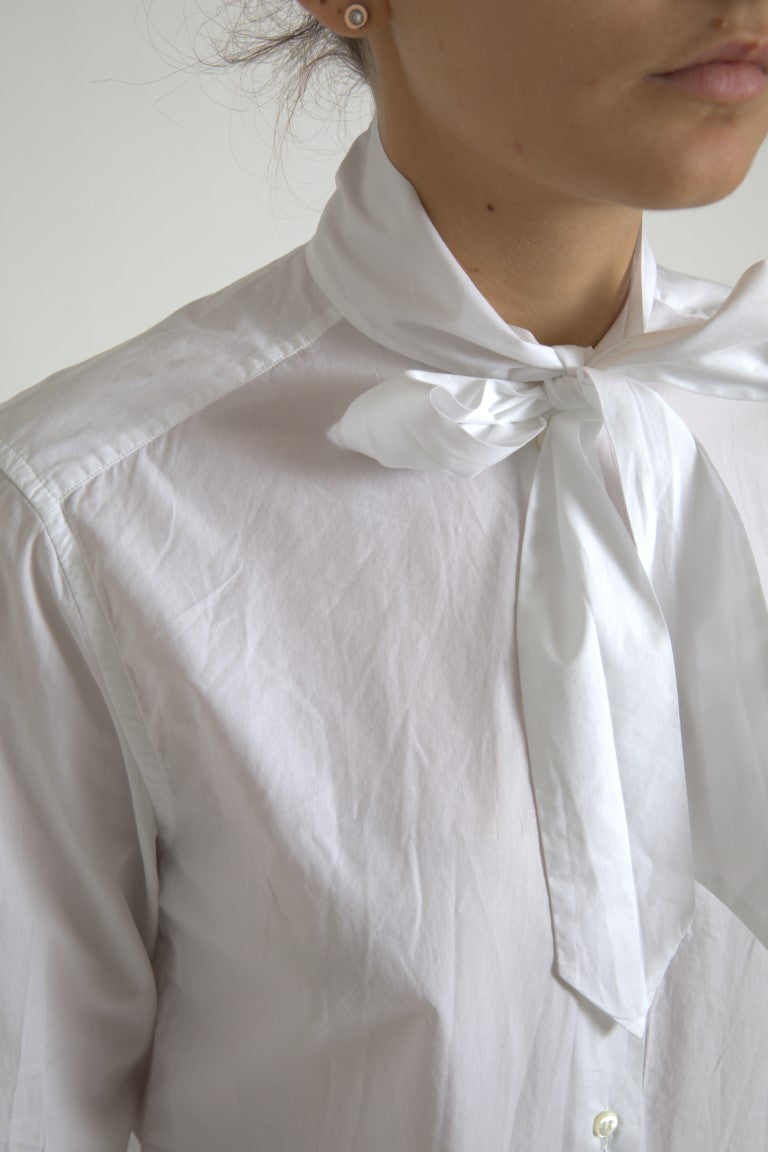 White cotton long-sleeve ascot collar top by Dolce & Gabbana, featuring a classic, elegant design.