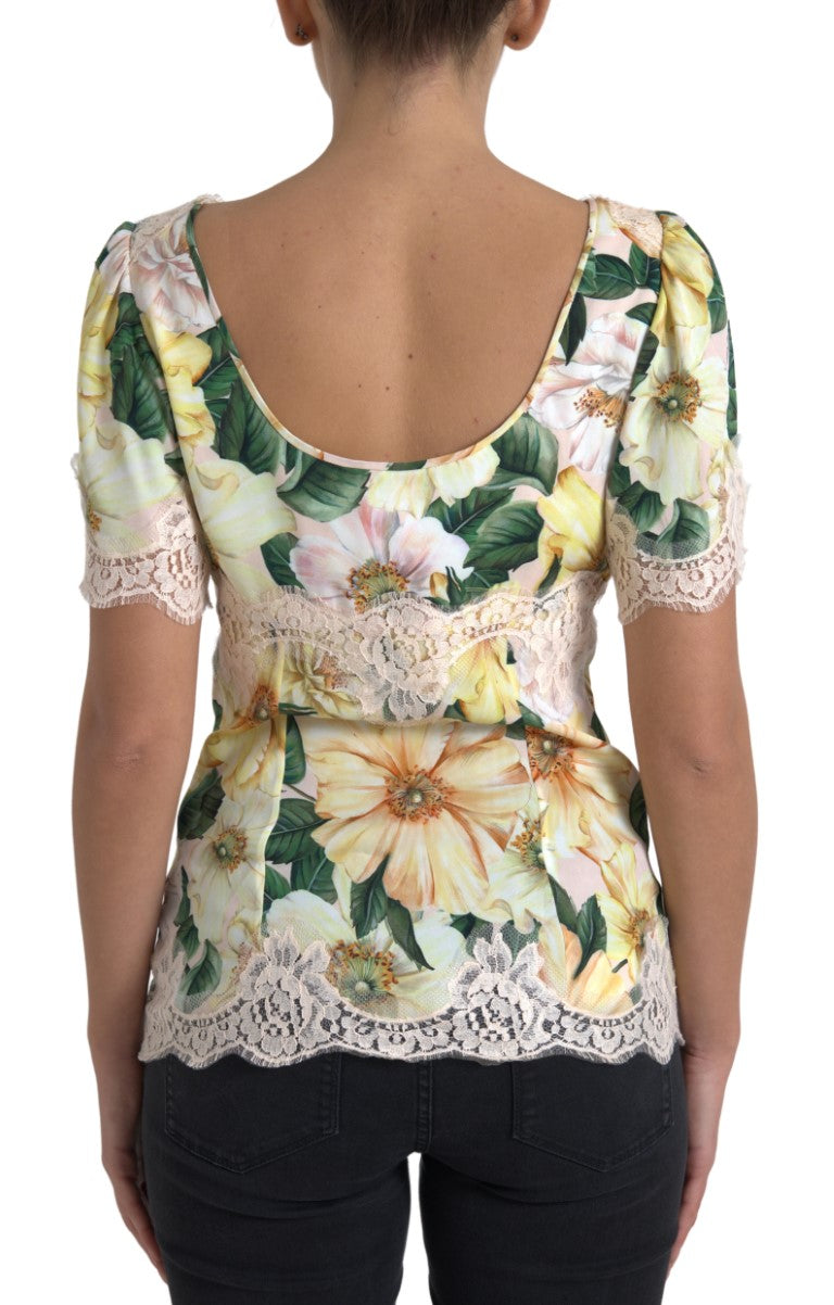 Multicolor floral lace V-neck blouse by Dolce & Gabbana with delicate lace details and vibrant floral patterns.