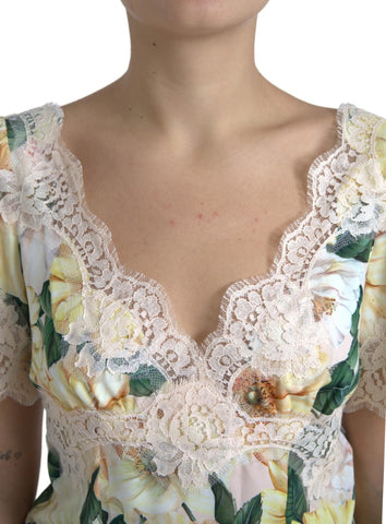 Multicolor floral lace V-neck blouse by Dolce & Gabbana featuring intricate lace details and a stylish V neckline.