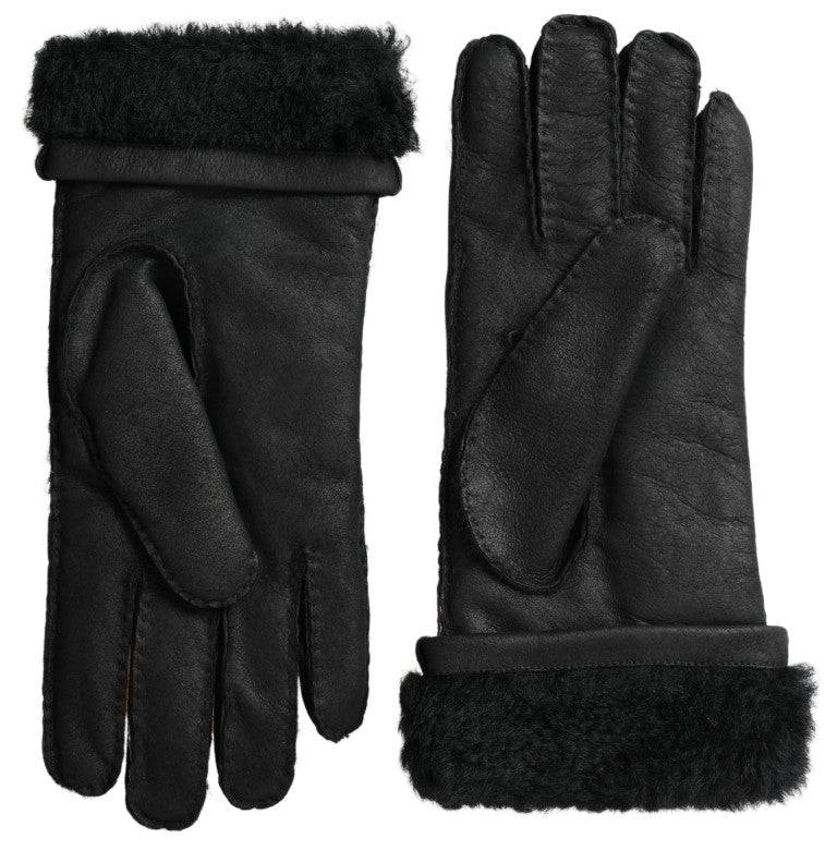 Black leather fur short men's gloves by Dolce & Gabbana with a stylish, fitted design and luxurious fur trim.
