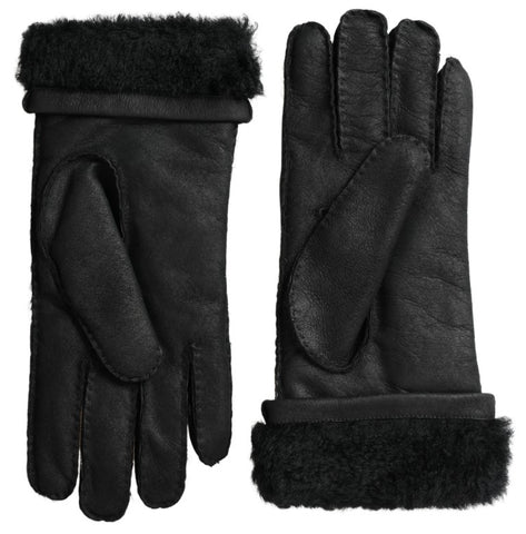 Black leather fur short men's gloves by Dolce & Gabbana with a stylish, fitted design and luxurious fur trim.