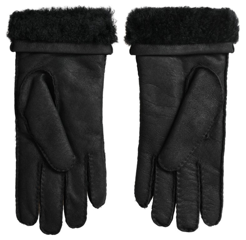Black leather and fur short men's gloves with mitten design by Dolce & Gabbana, showing close-up of textured material and stitching.