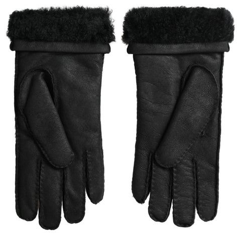 Black leather and fur short men's gloves with mitten design by Dolce & Gabbana, showing close-up of textured material and stitching.