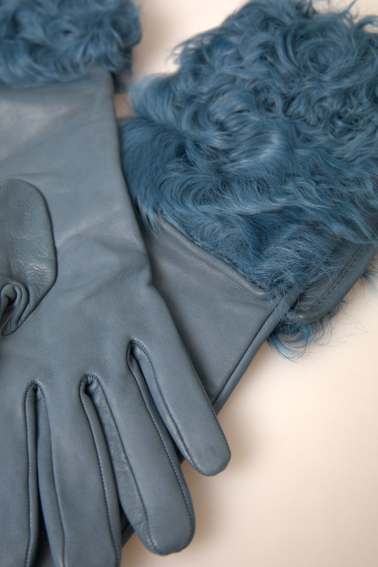 Blue leather mid-arm length gloves with fur trim from Dolce & Gabbana, showcasing luxurious craftsmanship and stylish design.