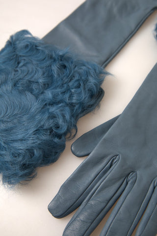Blue leather fur mid-arm length gloves by Dolce & Gabbana, featuring luxurious fur trim and sleek leather design.
