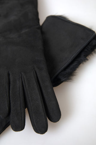 Black leather fur elbow-length gloves by Dolce & Gabbana, featuring luxurious fur trim and sleek design.