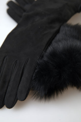 Black leather fur elbow length gloves by Dolce & Gabbana, featuring luxurious fur trim and sleek leather design.