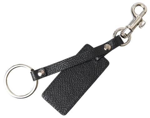 Black leather keychain with silver metal D&G logo, featuring Dolce & Gabbana branding and a sleek, stylish design.