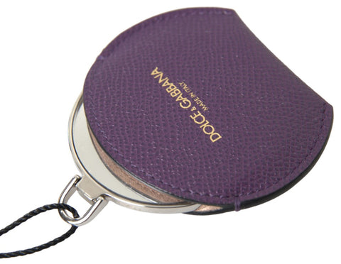 Purple calfskin leather round hand mirror holder by Dolce & Gabbana, featuring sleek stitching and compact design.