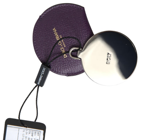 Purple calfskin leather round hand mirror holder with Dolce & Gabbana branding and detailed stitching.