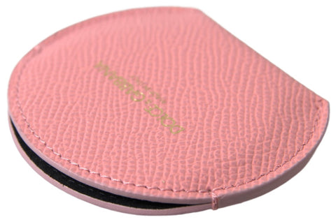 Pink calfskin leather round mirror holder by Dolce & Gabbana with smooth leather finish and elegant design.
