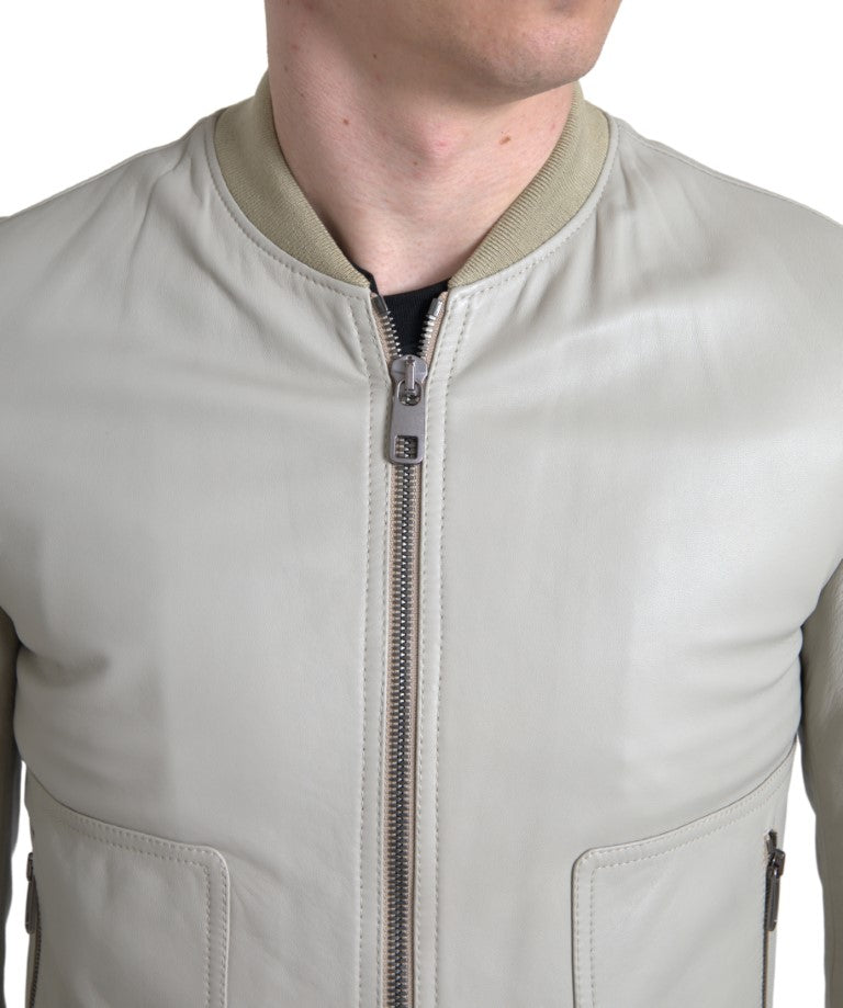Cream leather Dolce & Gabbana bomber jacket with full zip closure, stylish blouson design, and ribbed cuffs.