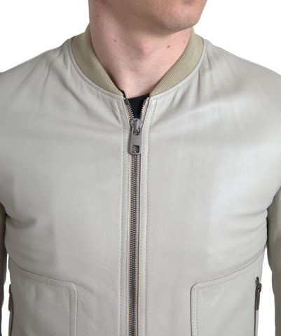 Cream leather Dolce & Gabbana bomber jacket with full zip closure, stylish blouson design, and ribbed cuffs.