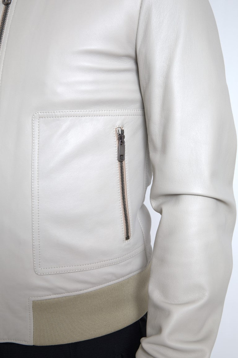 Cream leather bomber jacket with full zip closure by Dolce & Gabbana, featuring a classic fit and smooth leather texture.