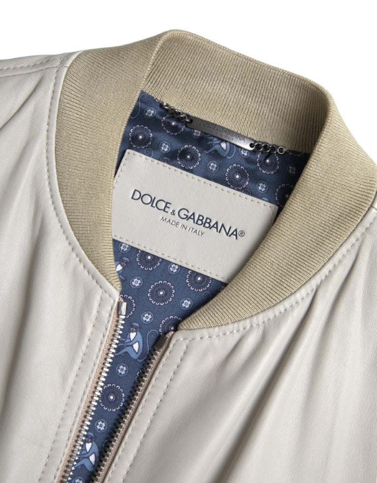 Cream leather bomber jacket by Dolce & Gabbana with full zip closure and ribbed collar and cuffs.