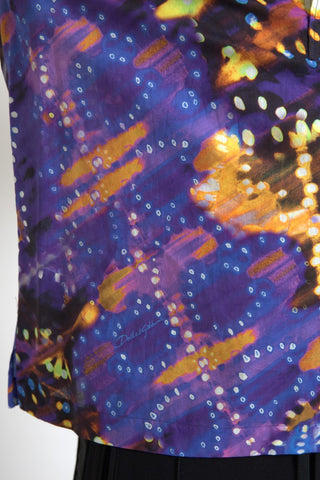 Dolce & Gabbana men's Luminaire print cotton polo top, showing front view with detailed pattern and classic collar.