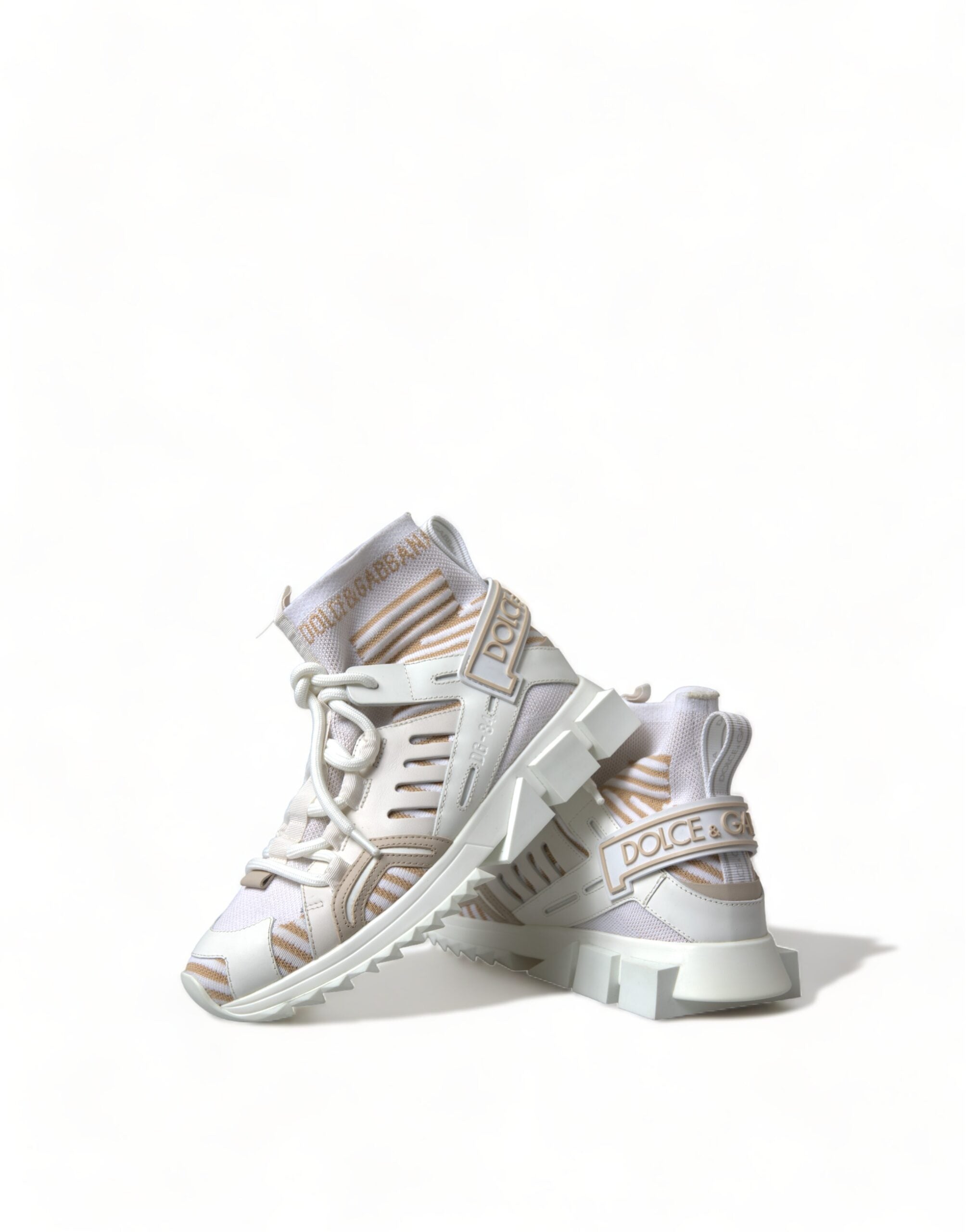 White and beige Sorrento sneakers by Dolce & Gabbana, featuring stylish sock-like design and casual sneaker silhouette.