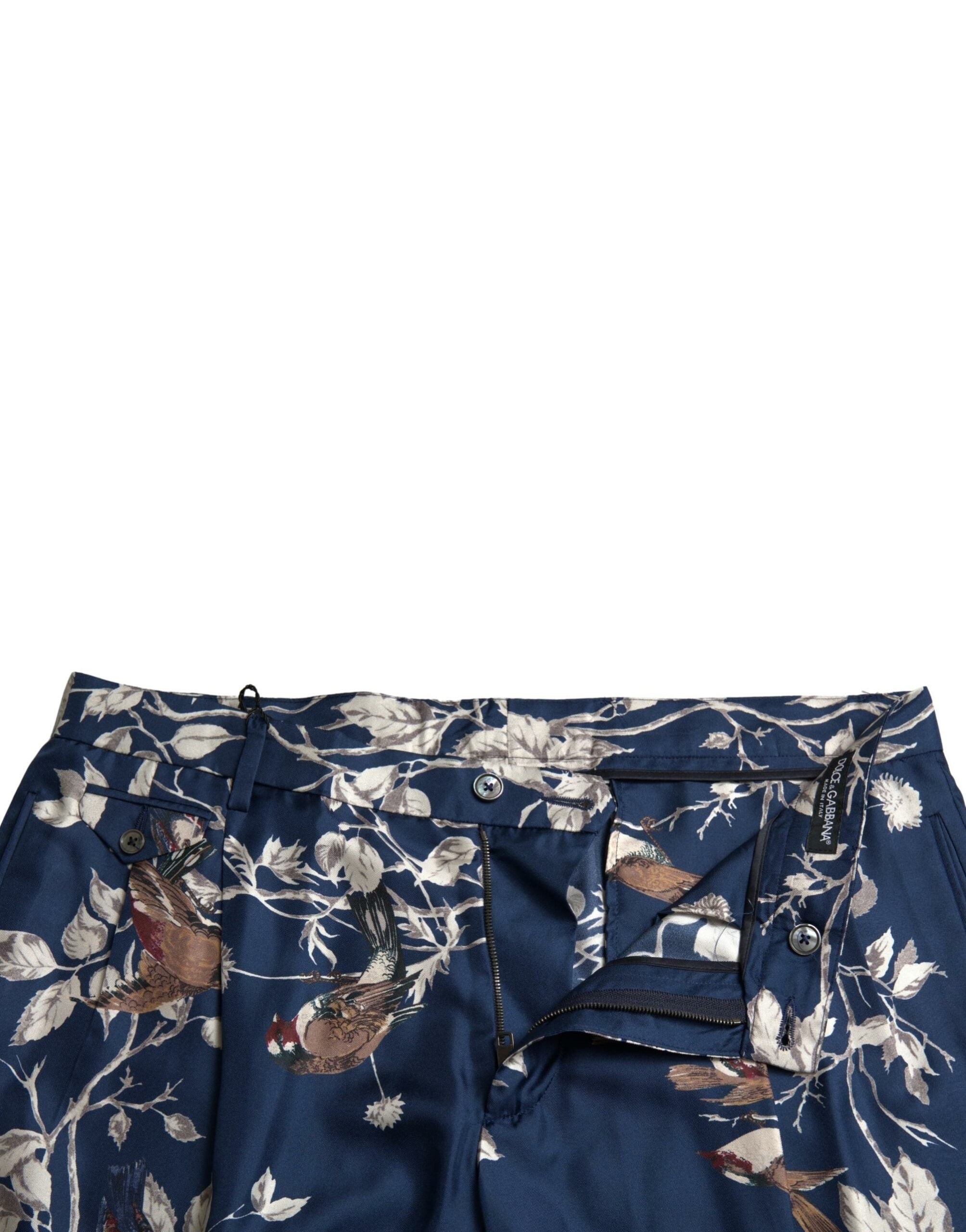 Blue floral print silk men's Bermuda shorts by Dolce & Gabbana, featuring a relaxed fit and stylish design.