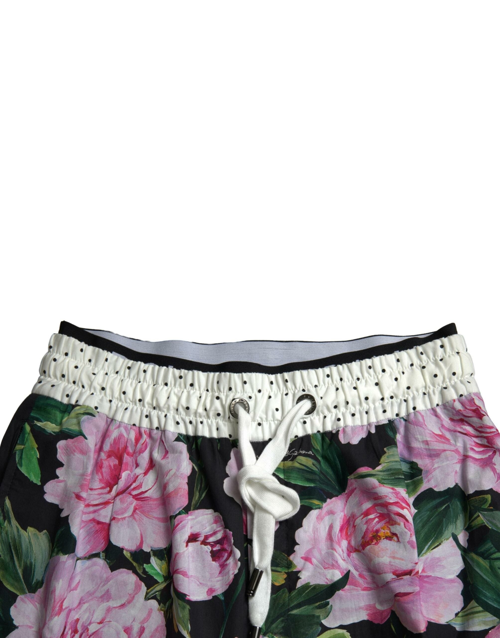 Multicolor peony print cotton joggers for men, stylish Dolce & Gabbana pants with a comfortable fit and vibrant floral design.