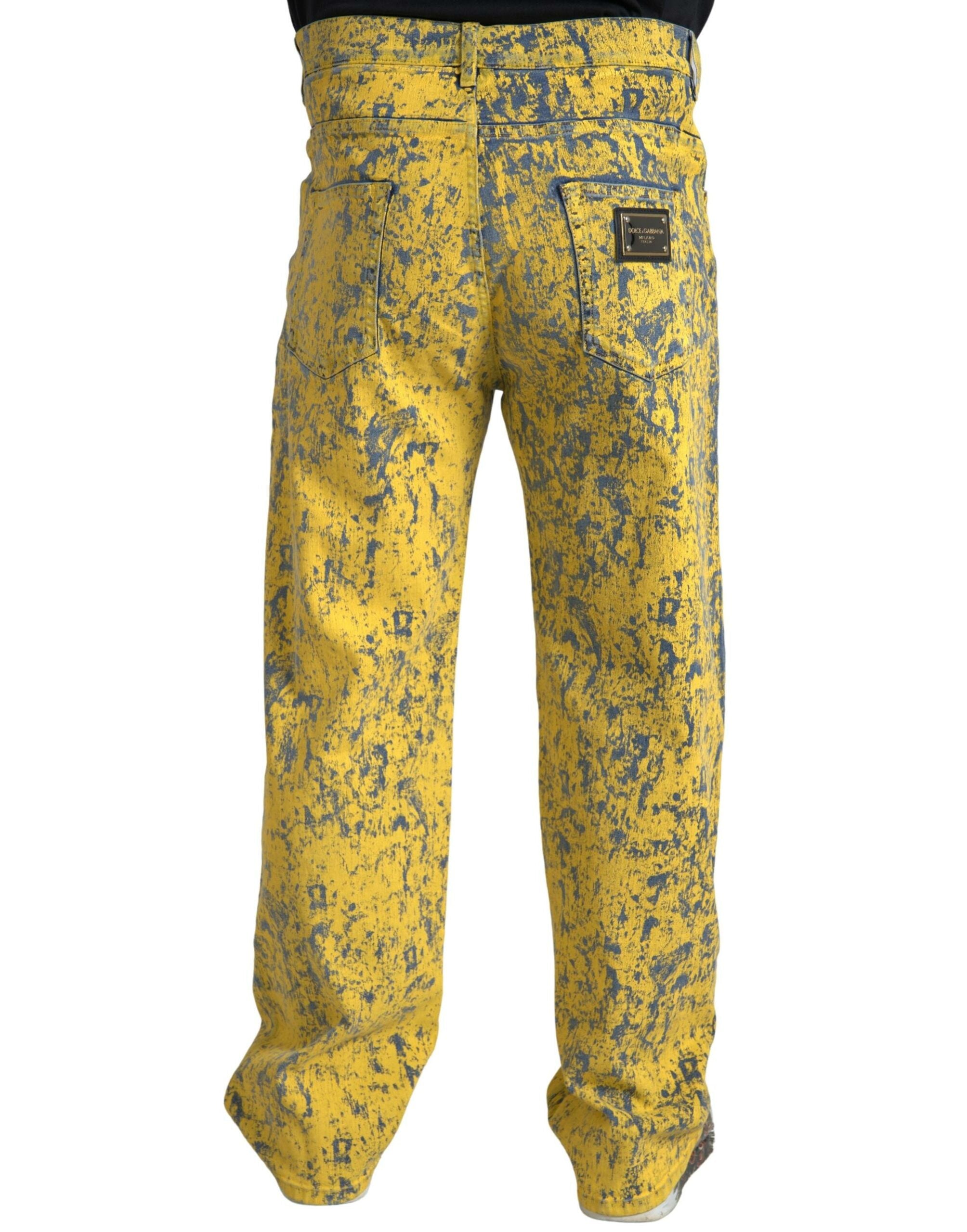 Yellow cotton tie-dye straight denim jeans by Dolce & Gabbana, showing the vibrant patterned fabric and classic fit.