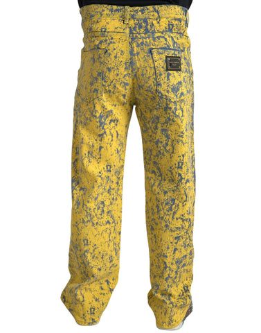 Yellow cotton tie-dye straight denim jeans by Dolce & Gabbana, showing the vibrant patterned fabric and classic fit.